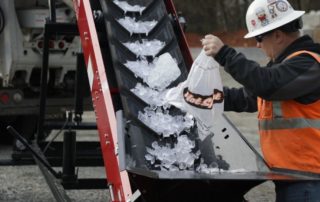 Dumping Ice onto Conveyor